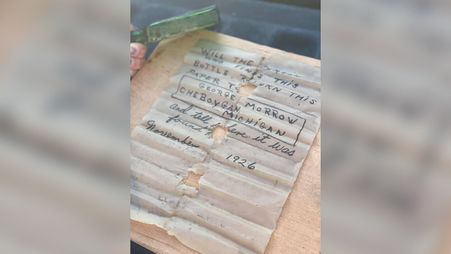A boat captain found a 95-year-old message in a bottle in Michigan. The internet helped track down the writer's daughter